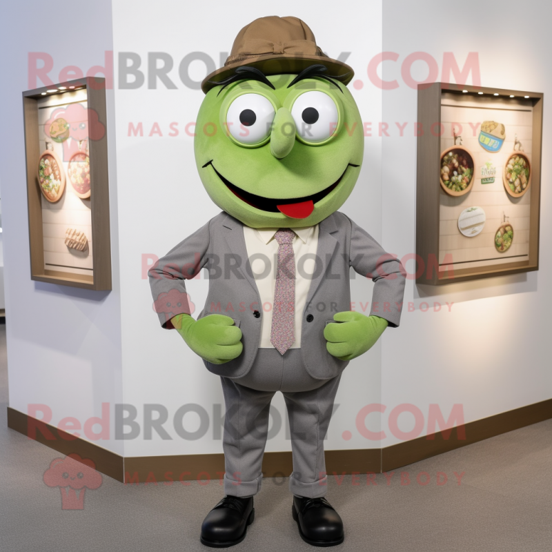 Olive Attorney mascot costume character dressed with a Button-Up Shirt and Cummerbunds Olive Attorney mascot costume character dressed with a Button-Up Shirt and Cummerbunds