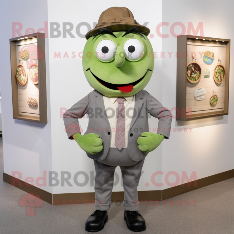 Olive Attorney mascot costume character dressed with a Button-Up Shirt and Cummerbunds