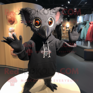 Black Aye-Aye mascot costume character dressed with a Sweatshirt and Shawl pins