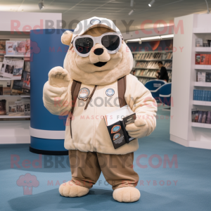 Beige Ray mascot costume character dressed with a Bomber Jacket and Reading glasses