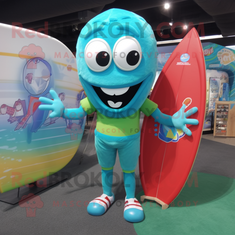 Turquoise Candy mascot costume character dressed with a Board Shorts and Ties Turquoise Candy mascot costume character dressed with a Board Shorts and Ties