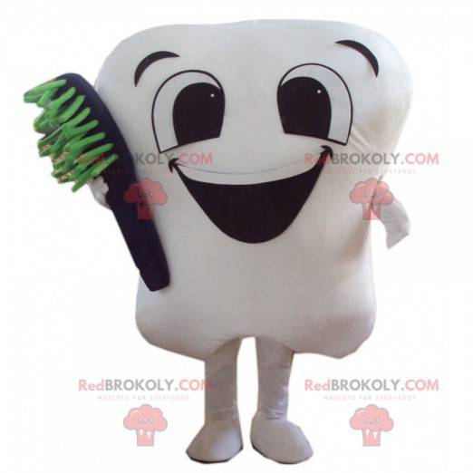 Kjempehvit maskot med en tannbørste - Redbrokoly.com
