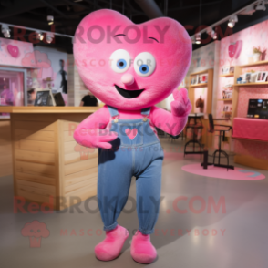 Pink Heart mascot costume character dressed with a Jeans and Earrings