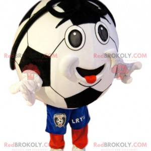 Sorridente mascotte pallone da calcio in pantaloncini blu -