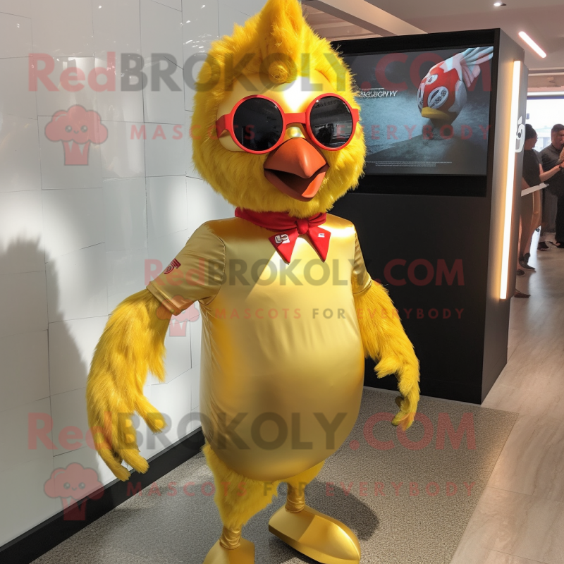 Gold Chicken mascot costume character dressed with a Rash Guard and Hair clips