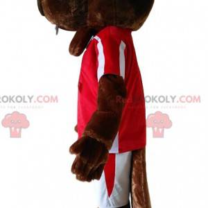 Castoro marrone mascotte con una maglia rossa. - Redbrokoly.com