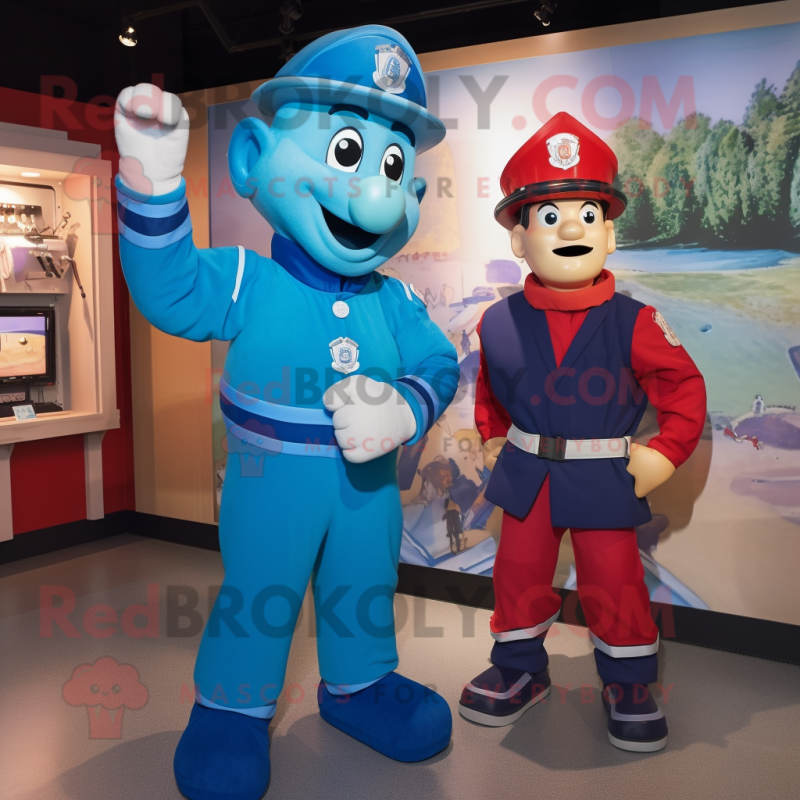 Blue Fire Fighter mascot costume character dressed with a Henley Tee and Cummerbunds Blue Fire Fighter mascot costume character dressed with a Henley Tee and Cummerbunds