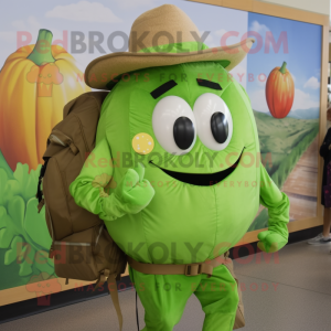 Green Tomato mascot costume character dressed with a Poplin Shirt and Backpacks