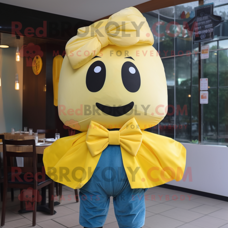 Yellow Dim Sum mascot costume character dressed with a Jeans and Bow ties Yellow Dim Sum mascot costume character dressed with a Jeans and Bow ties