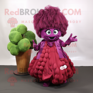 Magenta Grape mascot costume character dressed with a Pleated Skirt and Tie pins