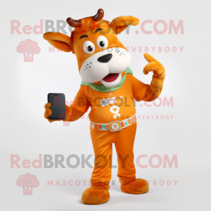Orange Guernsey Cow mascot costume character dressed with a Jumpsuit and Digital watches