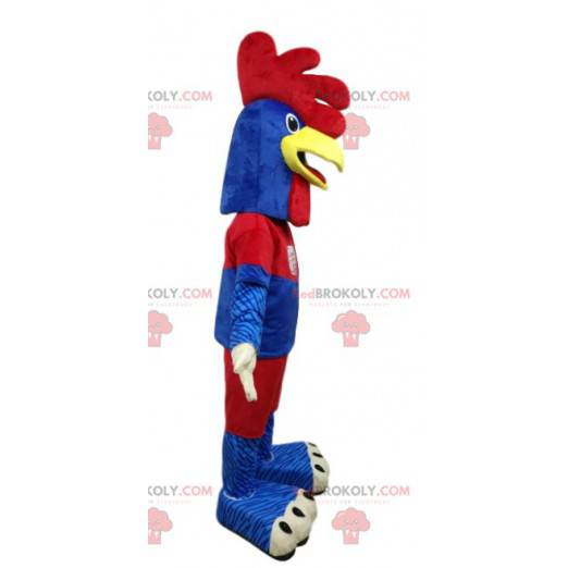 Mascotte de poulet en tenue de sport bleue et rouge -