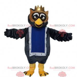 Mascotte gufo con una corona d'oro. Costume da gufo. -