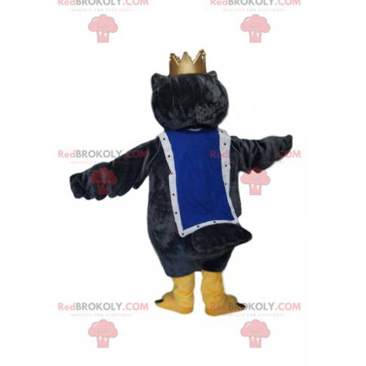 Eulenmaskottchen mit goldener Krone. Eulenkostüm. -