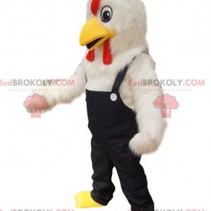 Mascotte di pollo bianco con tuta di jeans. - Redbrokoly.com