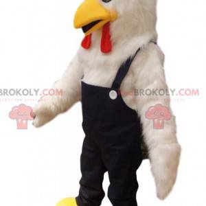Weißes Hühnermaskottchen mit Jeansoverall. - Redbrokoly.com