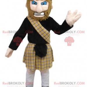 Homem mascote em traje tradicional escocês. - Redbrokoly.com
