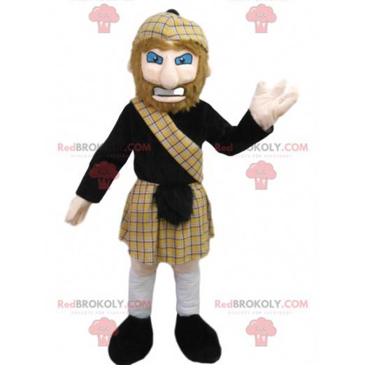 Mascotte man in traditionele Schotse klederdracht. -