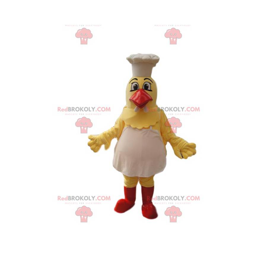 Mascota de pollo amarillo con delantal y gorro de cocinero. -