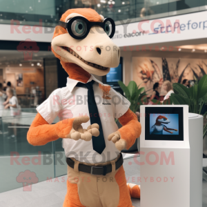 Peach Deinonychus mascot costume character dressed with a Oxford Shirt and Smartwatches