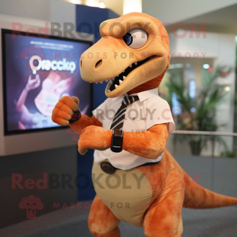 Peach Deinonychus mascot costume character dressed with a Oxford Shirt and Smartwatches