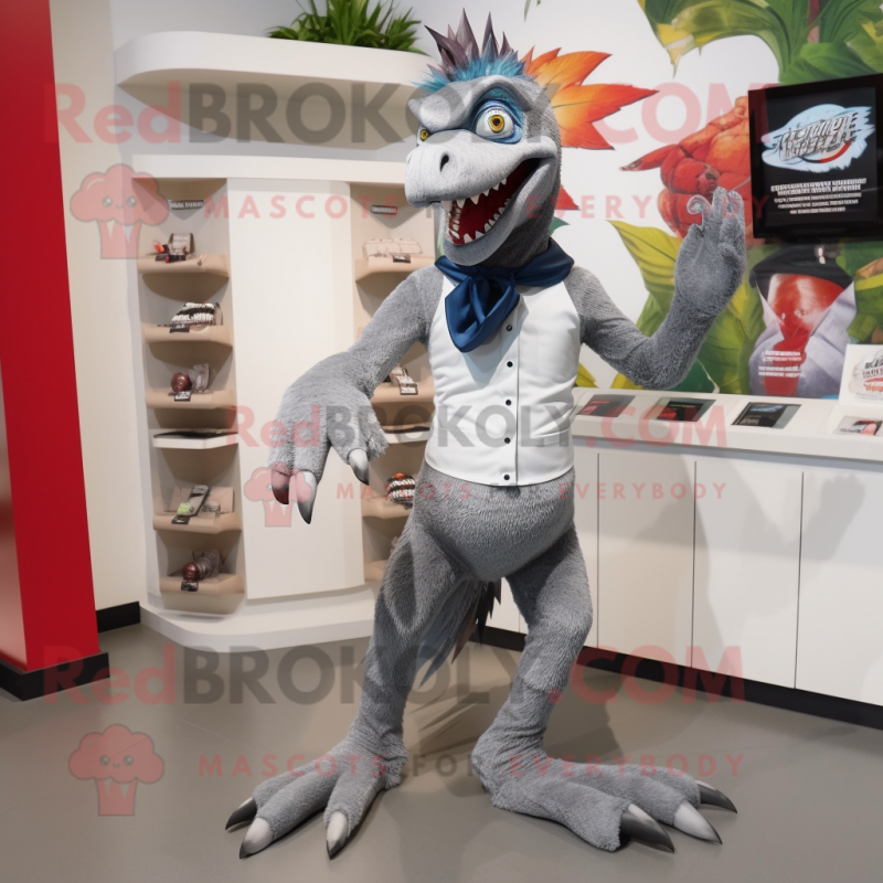 Silver Utahraptor mascot costume character dressed with a Bermuda Shorts and Wallets Silver Utahraptor mascot costume character dressed with a Bermuda Shorts and Wallets