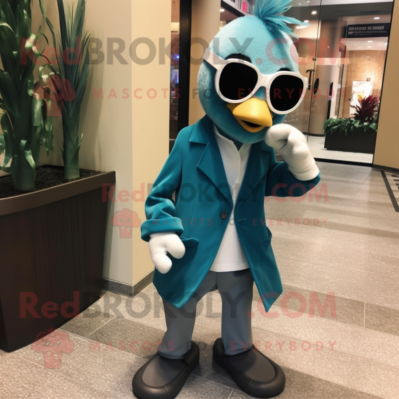 Teal Attorney mascot costume character dressed with a Jacket and Sunglasses Teal Attorney mascot costume character dressed with a Jacket and Sunglasses