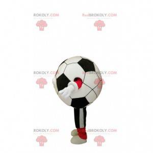 De glimlachende mascotte van de voetbalbal in sportkleding -
