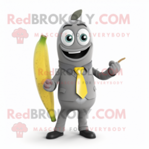 Gray Banana mascot costume character dressed with a Suit Pants and Bracelet watches