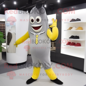 Gray Banana mascot costume character dressed with a Suit Pants and Bracelet watches