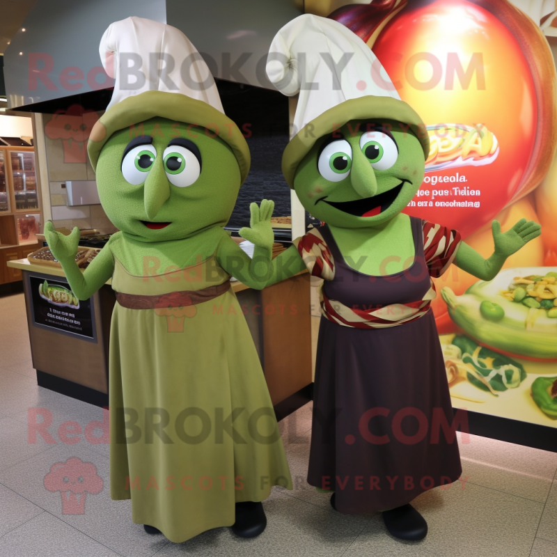 Olive Fajitas mascot costume character dressed with a Empire Waist Dress and Beanies Olive Fajitas mascot costume character dressed with a Empire Waist Dress and Beanies