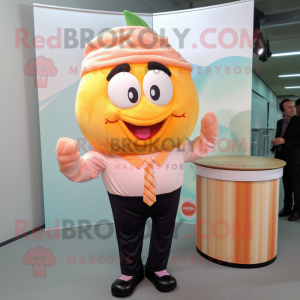 Peach Cupcake mascot costume character dressed with a Trousers and Ties