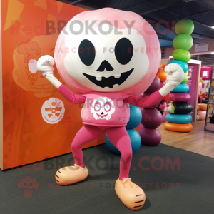 Peach Skull mascot costume character dressed with a Yoga Pants and Mittens