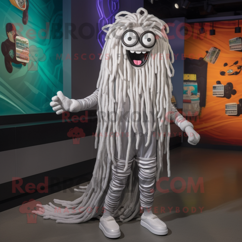 Silver Spaghetti mascot costume character dressed with a Leggings and Eyeglasses