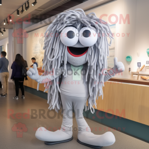 Silver Spaghetti mascot costume character dressed with a Leggings and Eyeglasses