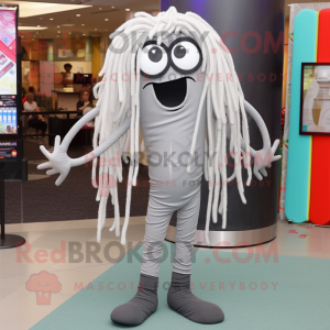 Silver Spaghetti mascot costume character dressed with a Leggings and Eyeglasses