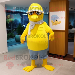Lemon Yellow Seagull mascot costume character dressed with a Jeans and Berets
