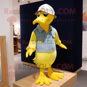 Lemon Yellow Seagull mascot costume character dressed with a Jeans and Berets
