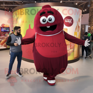 Maroon Falafel mascot costume character dressed with a Joggers and Rings