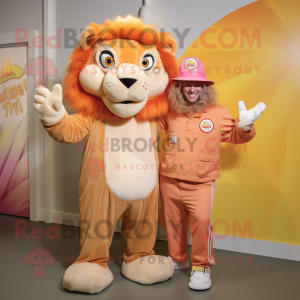 Peach Tamer Lion mascot costume character dressed with a Henley Tee and Wraps