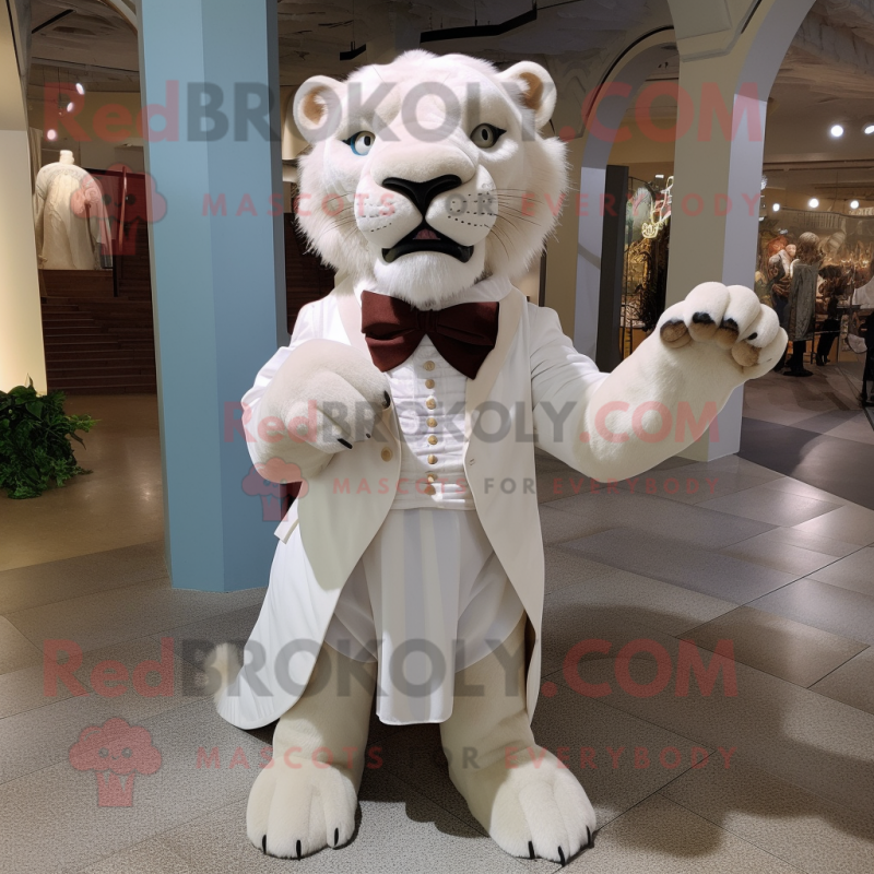 White Smilodon mascot costume character dressed with a Empire Waist Dress and Bow ties