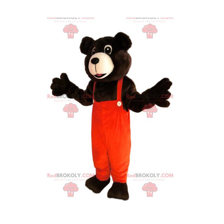 Braunbärenmaskottchen mit orangefarbenem Overall -