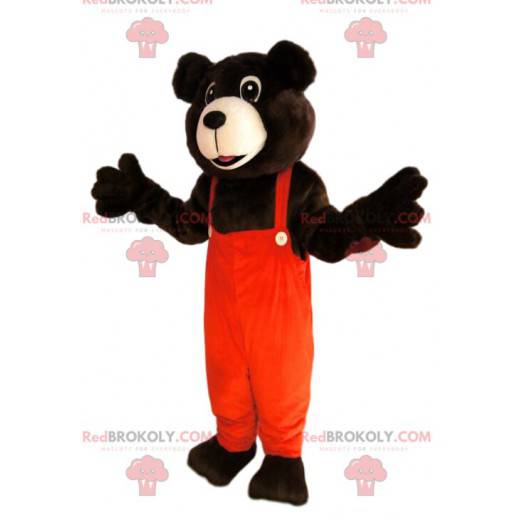 Mascotte d'ours brun avec une salopette orange - Redbrokoly.com