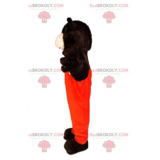 Braunbärenmaskottchen mit orangefarbenem Overall -