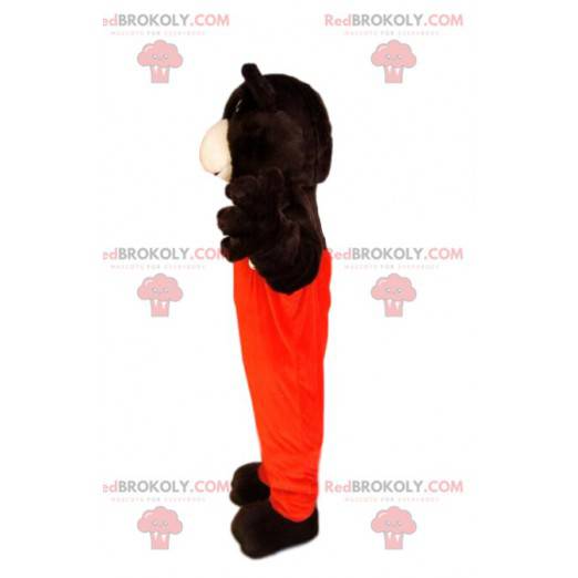 Braunbärenmaskottchen mit orangefarbenem Overall -