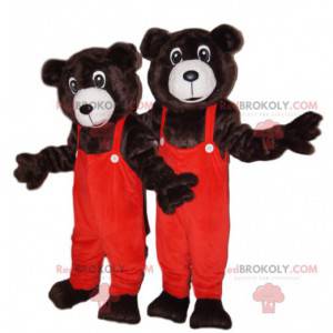 Braunbärenmaskottchen mit orangefarbenem Overall -