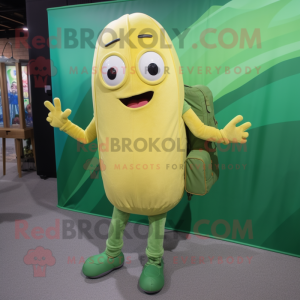 Gold Green Bean mascot costume character dressed with a Jeggings and Backpacks