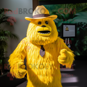 Yellow Sasquatch mascot costume character dressed with a Suit and Hat pins