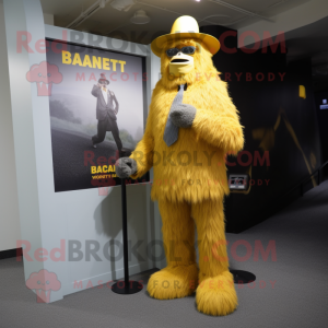 Yellow Sasquatch mascot costume character dressed with a Suit and Hat pins