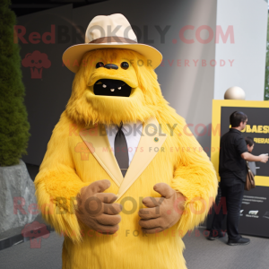 Yellow Sasquatch mascot costume character dressed with a Suit and Hat pins